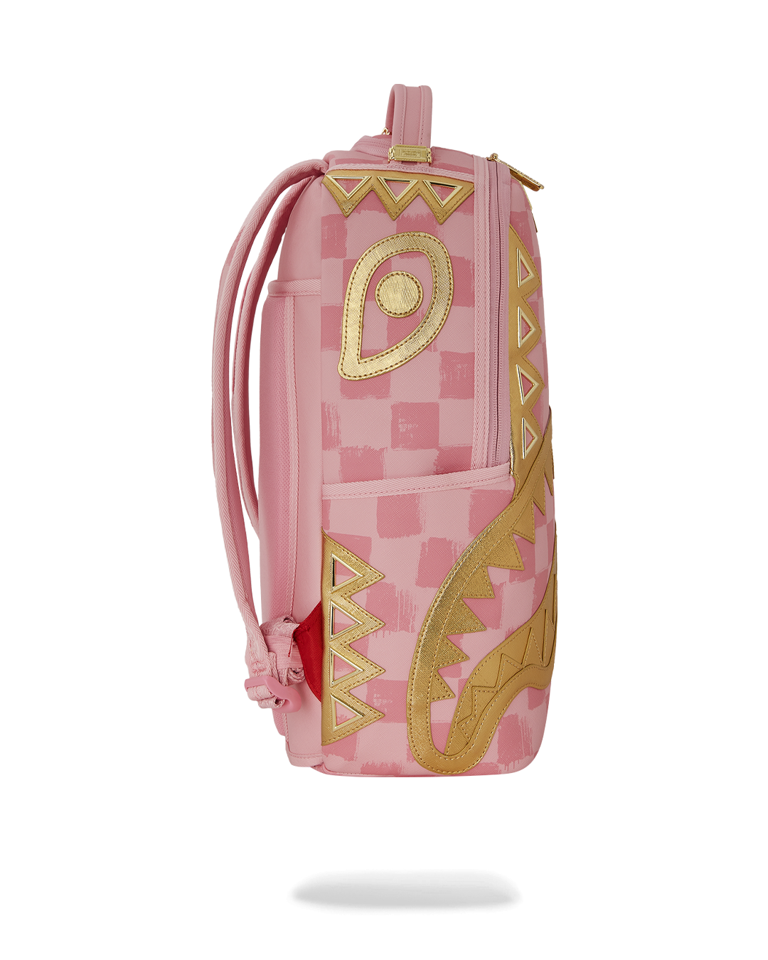 Interior shot of the Sprayground backpack featuring a laptop compartment and mesh organizer