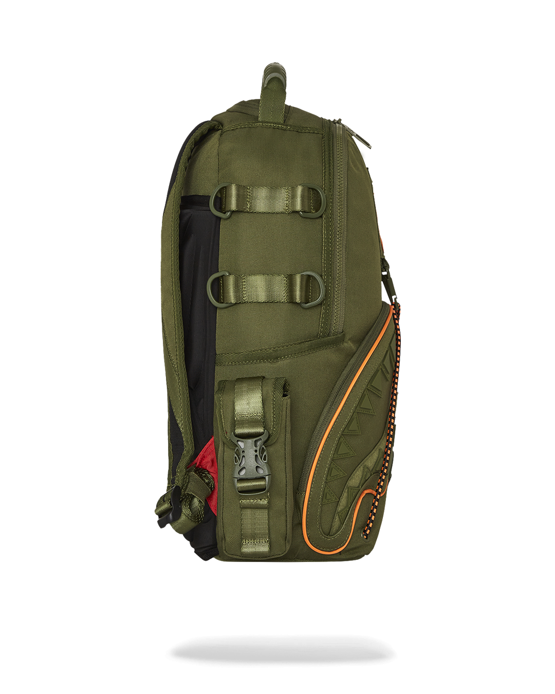 Person wearing tactical sling backpack while hiking wooded trail