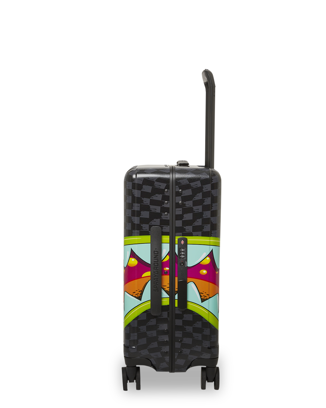 Traveler using hard shell carry-on luggage at the airport.
