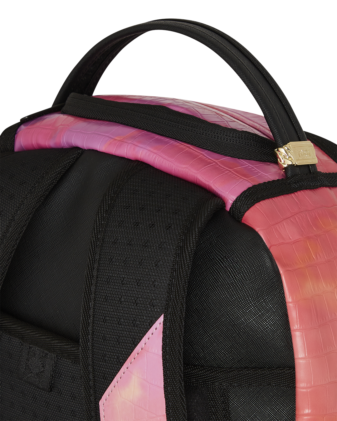 Top-down shot of luxury backpack brands featuring velour compartments and mesh padding