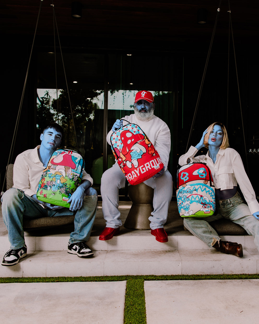 Smurfs Garden Adventure Backpack with front pocket and side compartments.