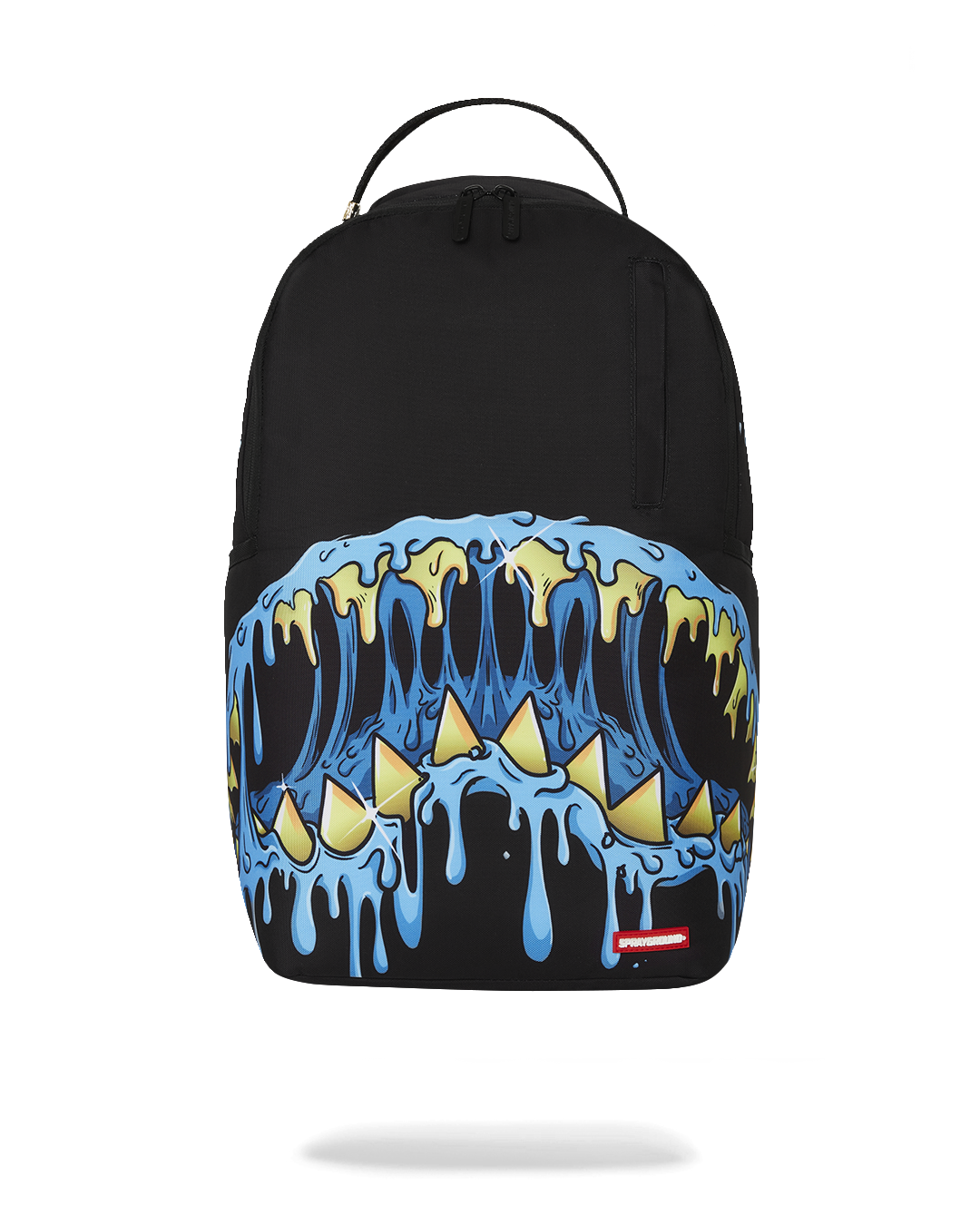 Close-up of the Mega Melt Shark Backpack with bold shark graphic and gold zippers