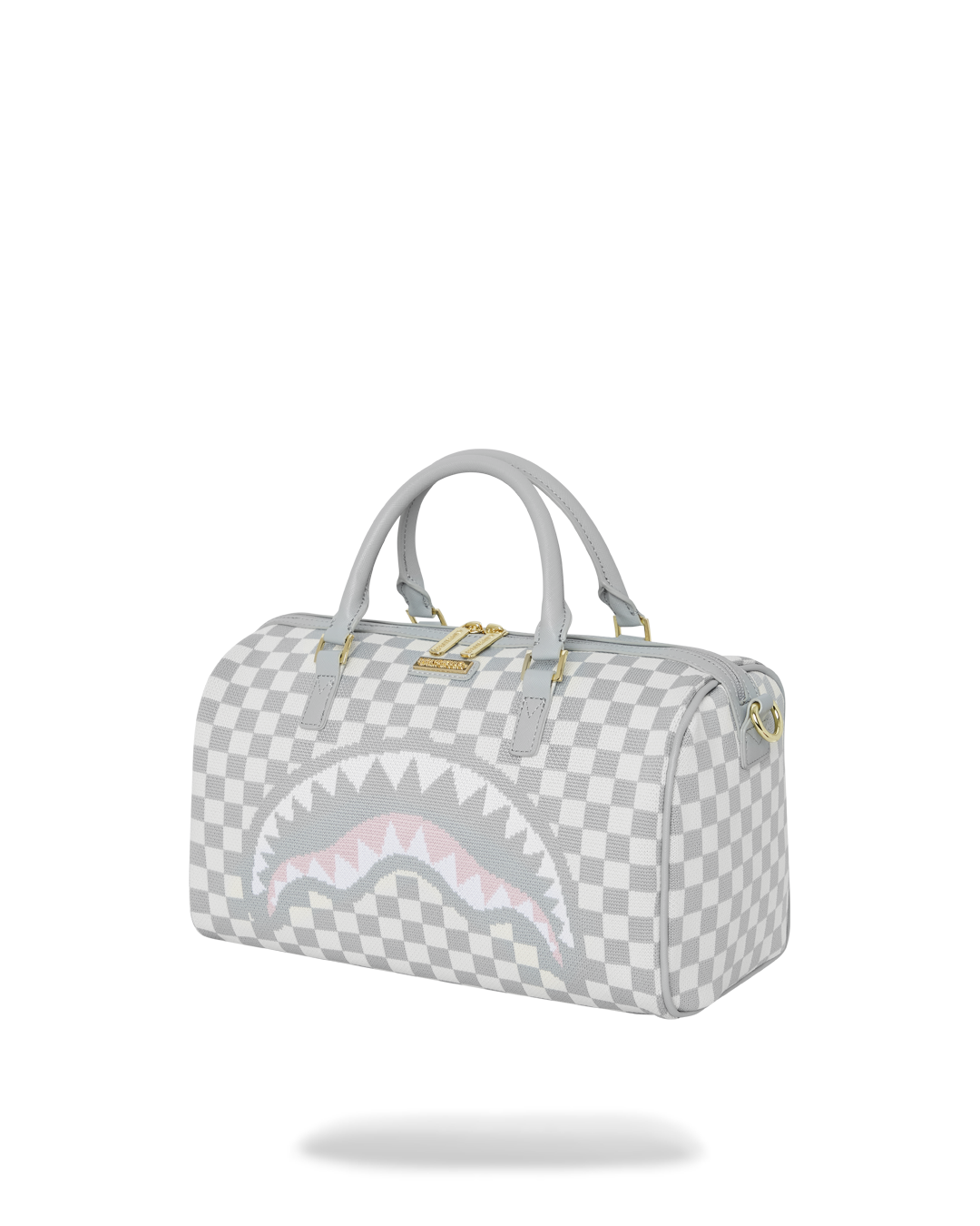 Close-up of the sharkmouth detail on the black crossbody bag-inspired design