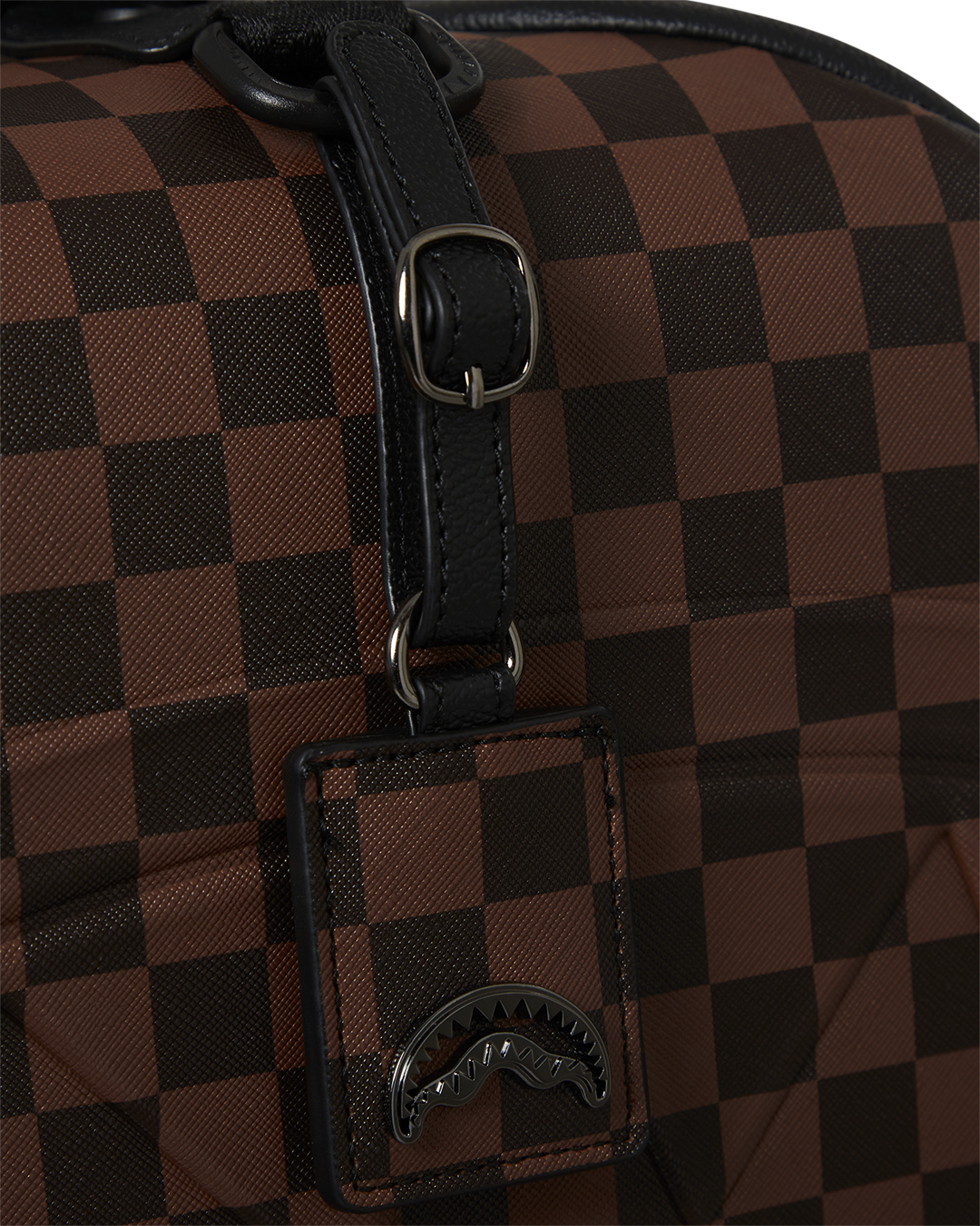 Close-up of the luggages 100% Polycarbonate shell and 4 dual spinning wheels, showcasing its durability and smooth navigation.