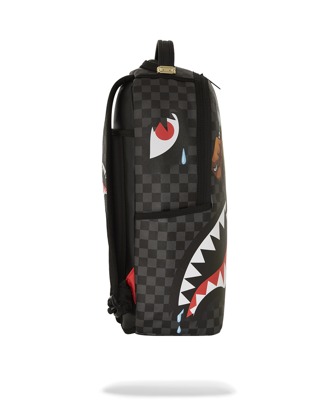 Top view of the Sprayground backpack looney tunes design with ergonomic straps and luggage sleeve