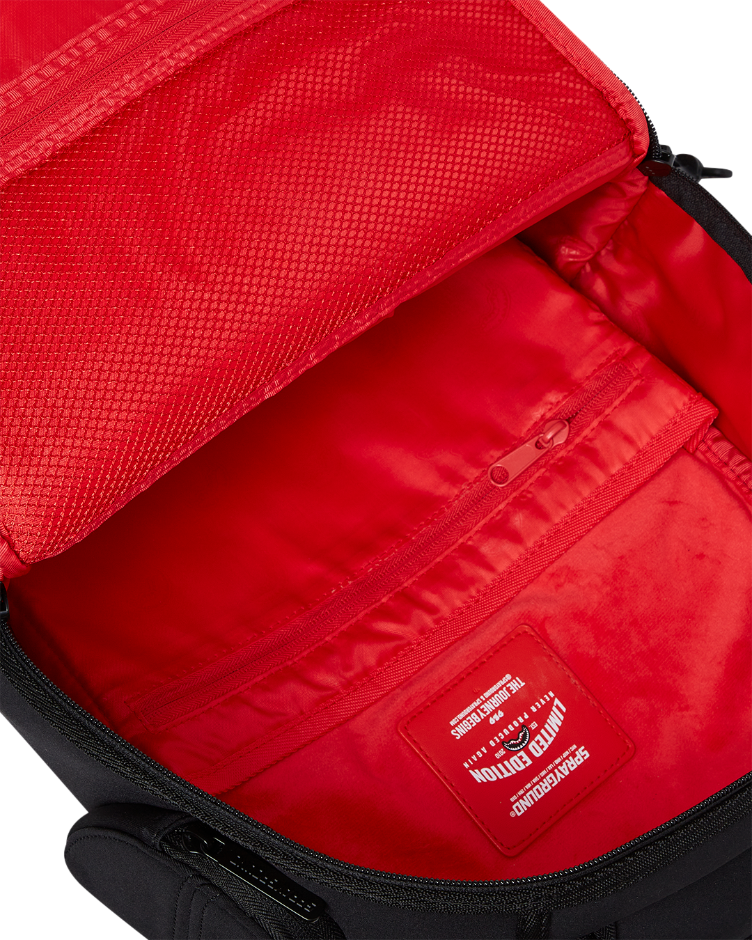 Vivid pink sprayground backpack with zippered compartments for style and practicality