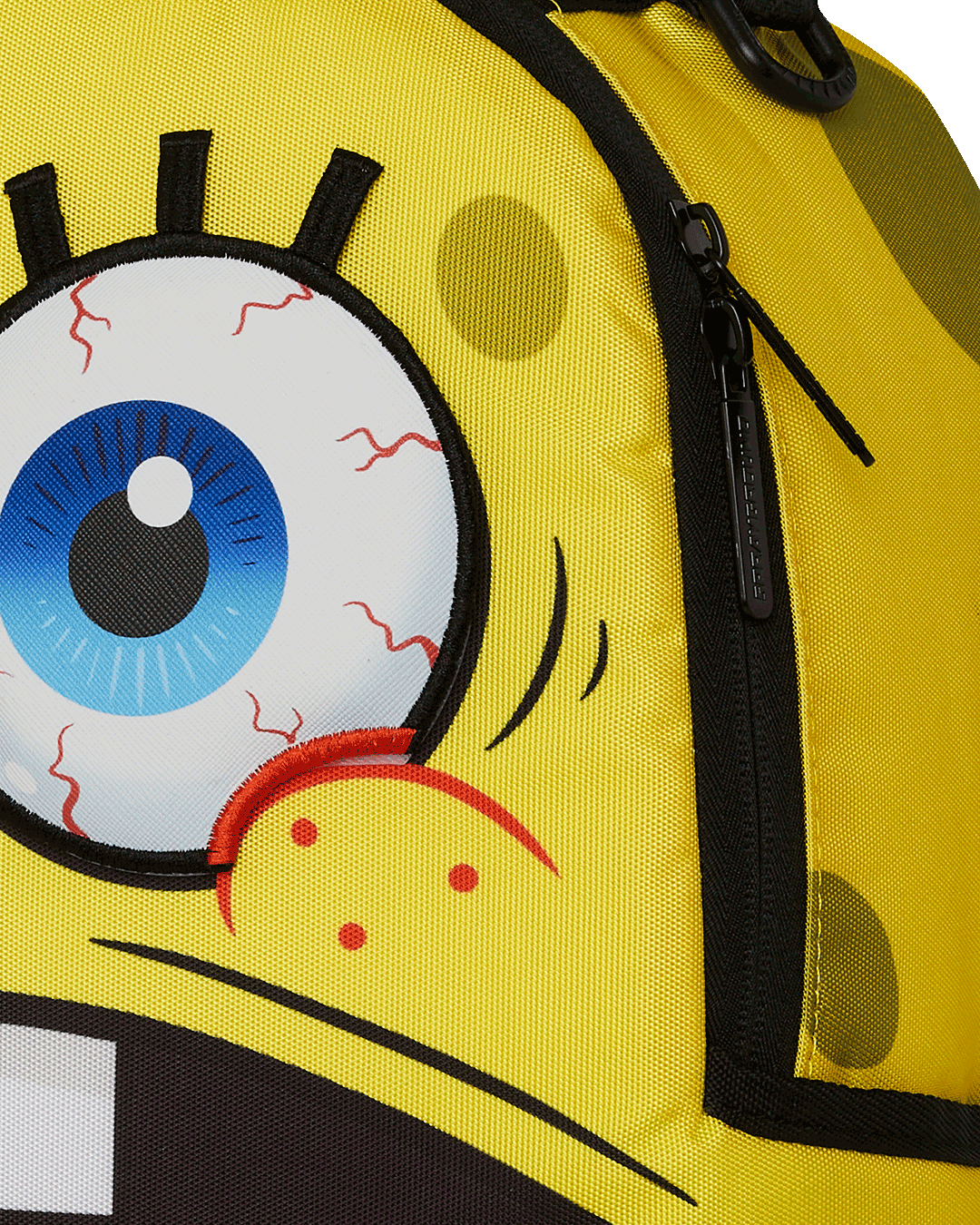 Front view of the SpongeBob character backpack with expressive velcro eyes