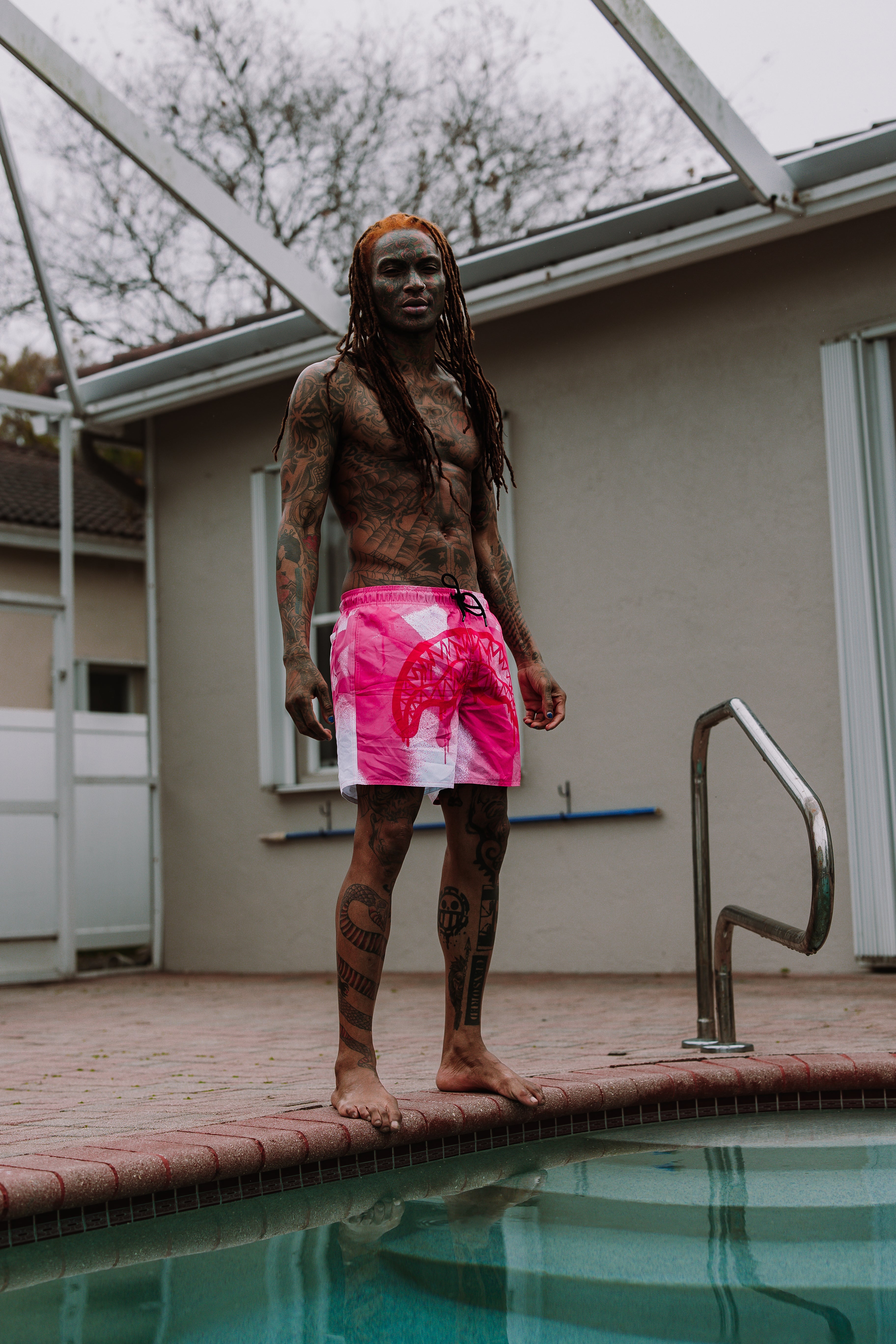 Front view of Storm-Ready Swim Shorts showcasing the elastic waistband and side pockets.