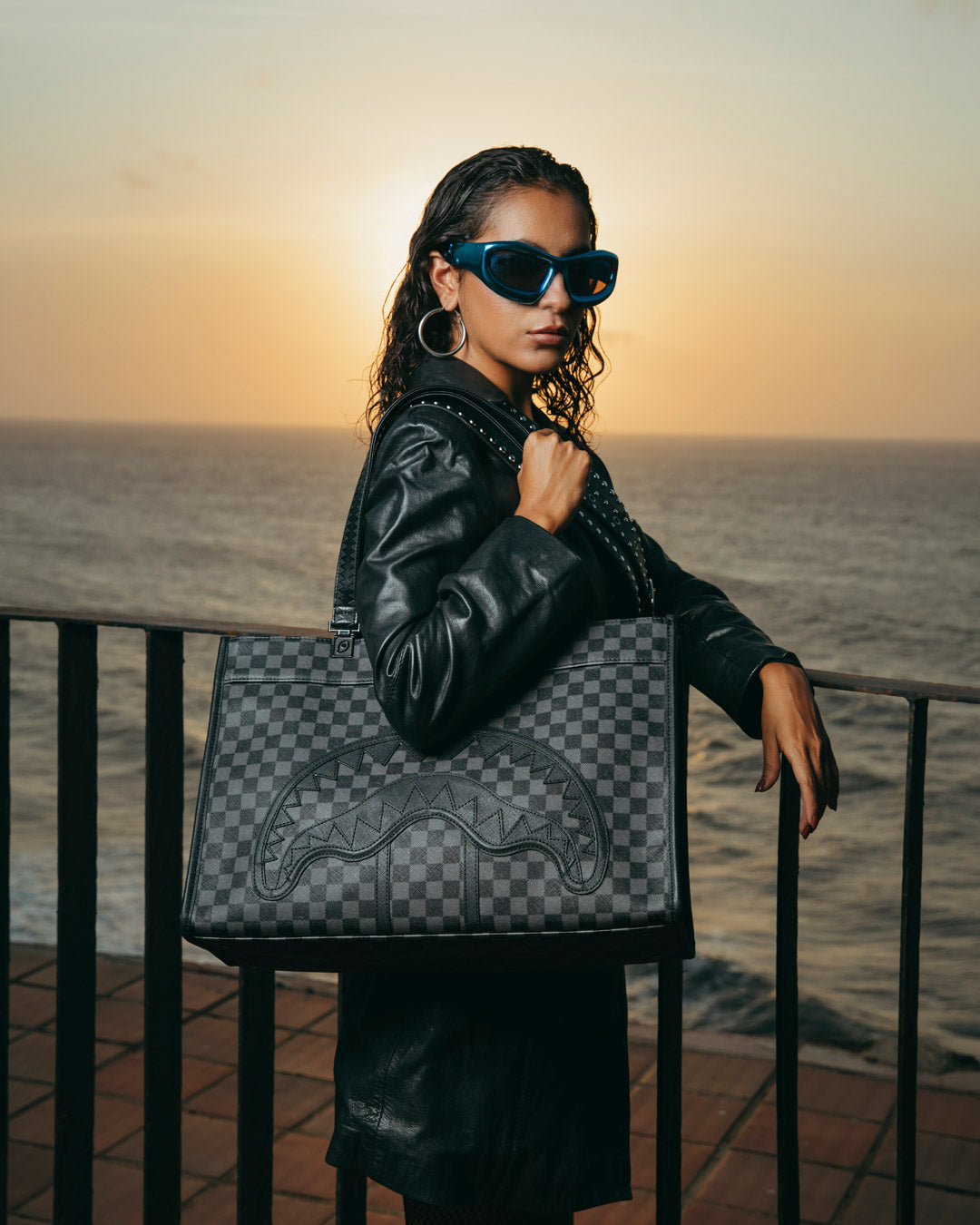 Interior view of Midnight Chateau tote bag showcasing zipper pocket and cellphone holder.