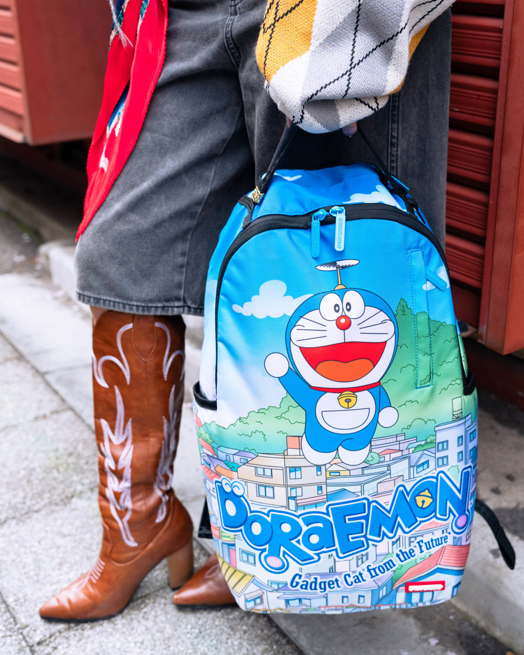 Front view of the animated backpack showcasing its fun design