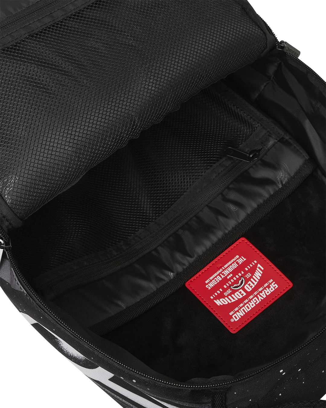 Sprayground backpack with velour laptop compartment and mesh organizer