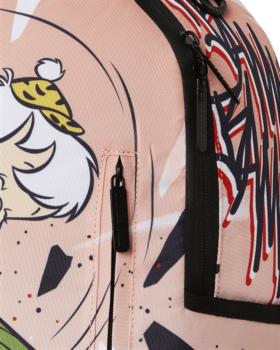 Close-up of the metal Sprayground Authentic badge on the Bamm Bamm Flintstones backpack