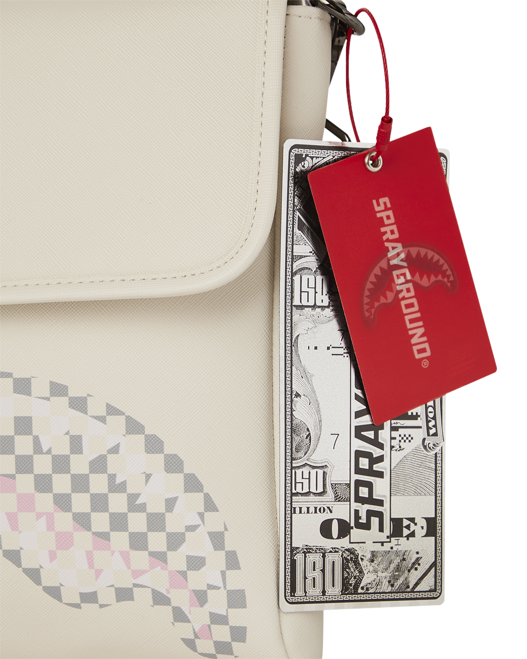Close-up of faux leather crossbody bag in natural outdoor lighting