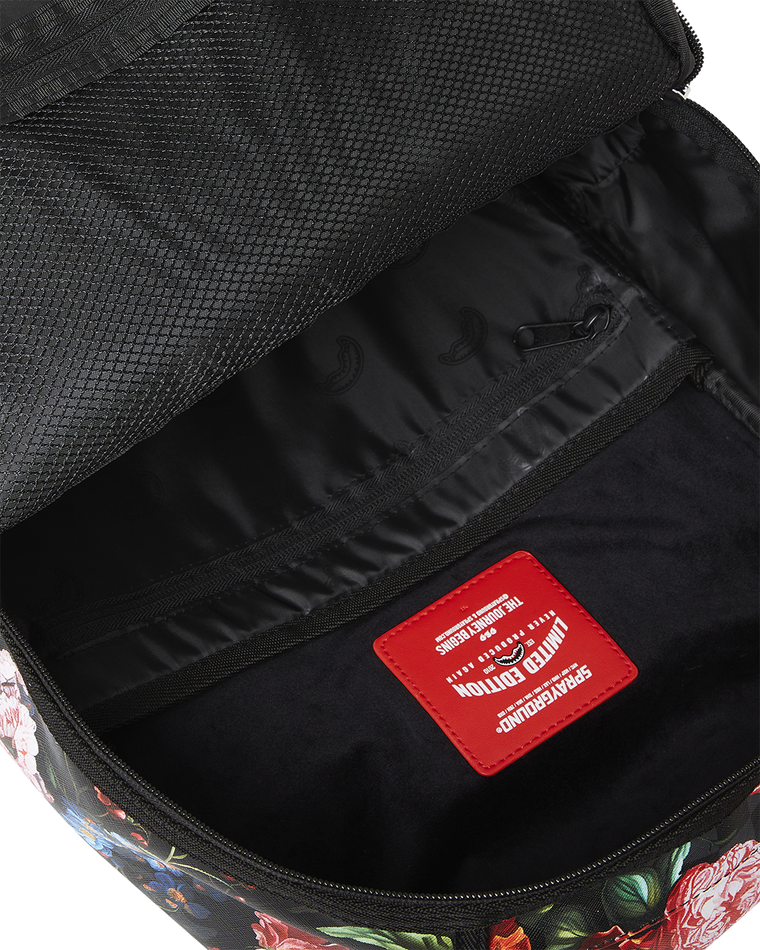 Interior showing velour laptop compartment and organizer pockets