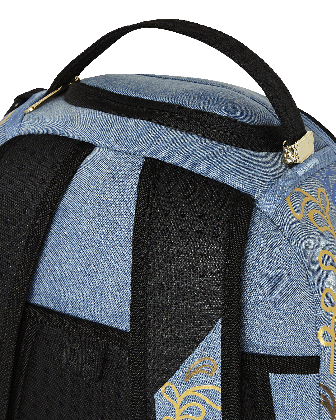 Back angle featuring ergonomic mesh padding and slide-through luggage sleeve