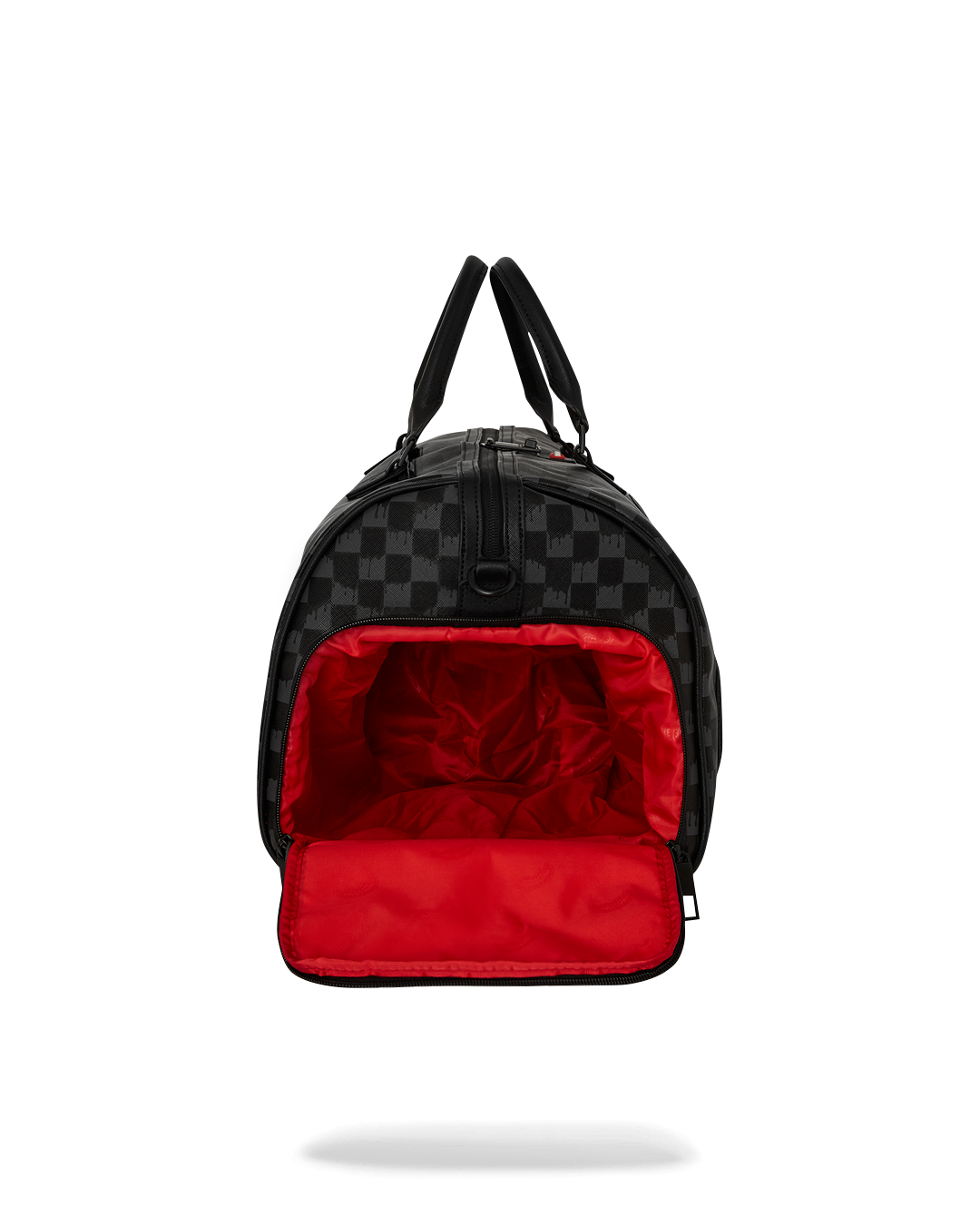 Interior shot of the leather duffle bag showing spacious compartments and metal hardware