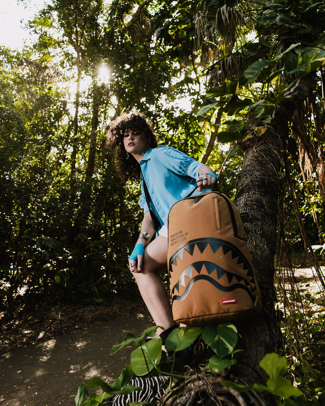 Shark backpack front view showing bold print and side pockets