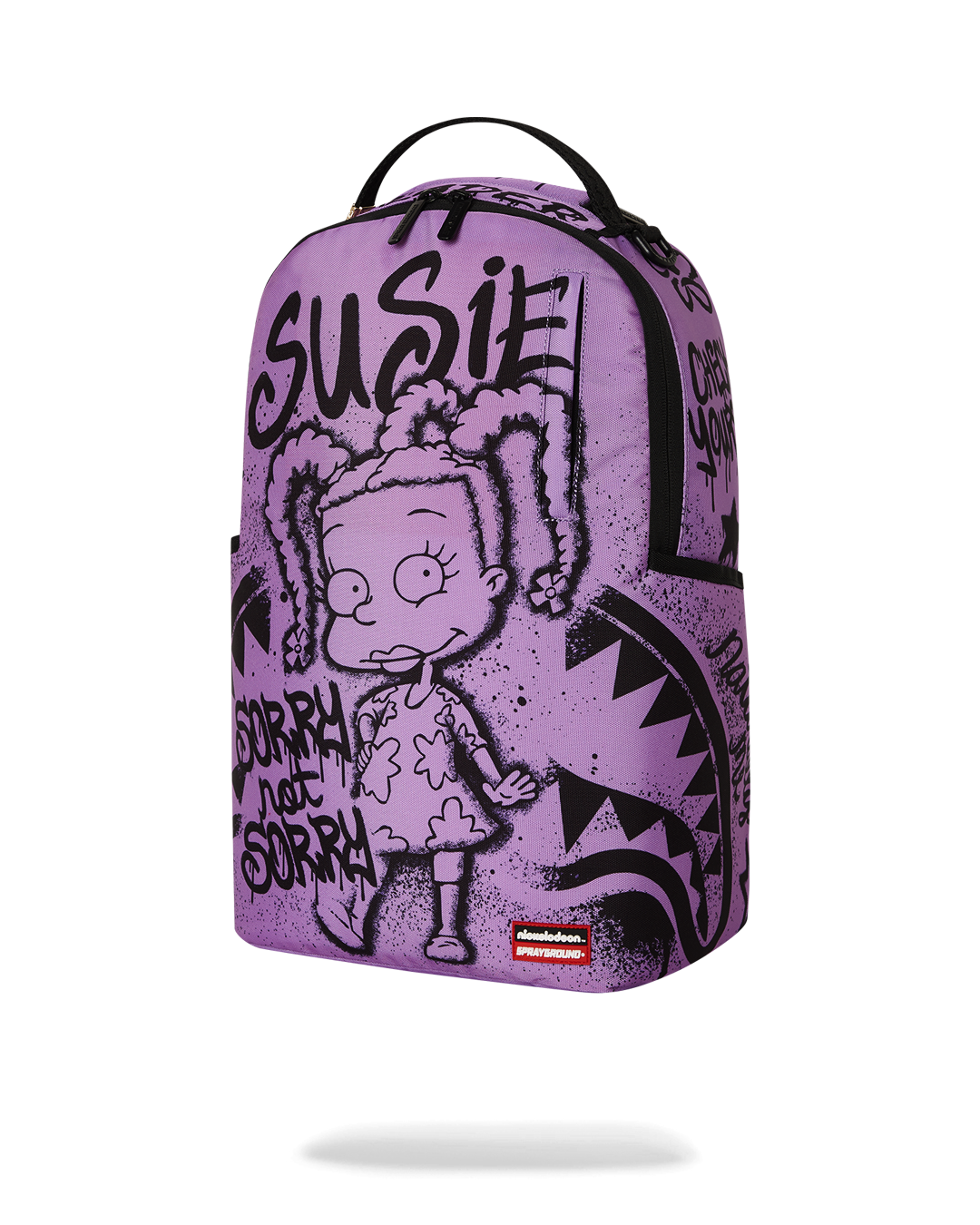 Sprayground Rugrats backpack worn by student on urban campus