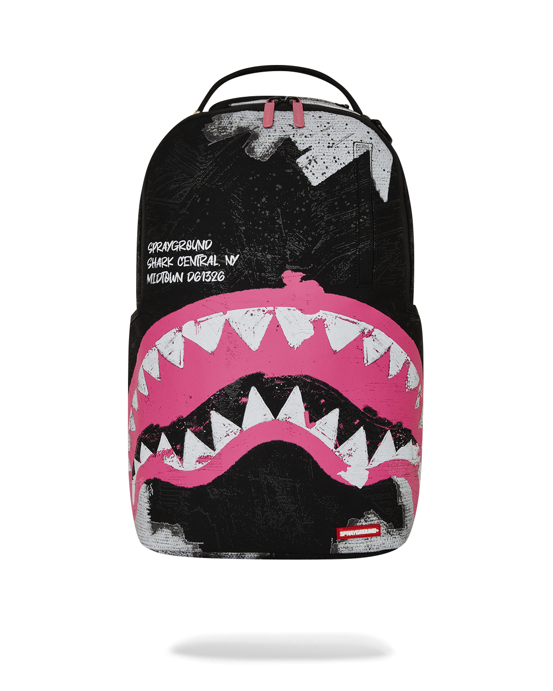 Front view of the Shark Central waxed cotton canvas backpack showing side pockets and front zipper.