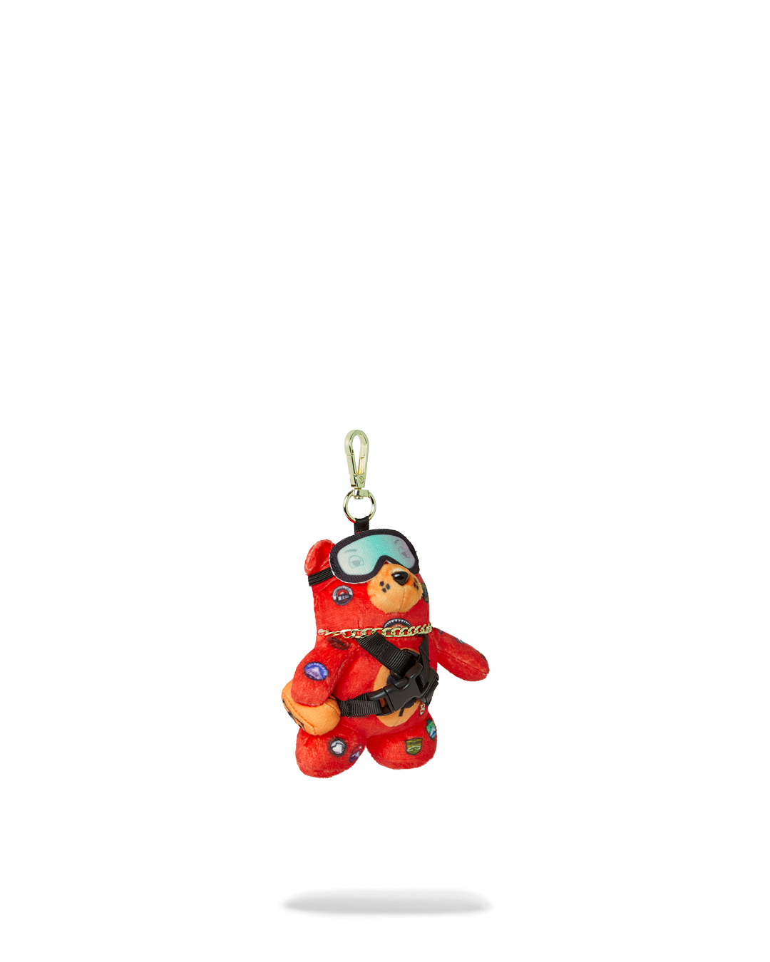 Miniature teddy bear keychain styled with money pouch and soft detailing