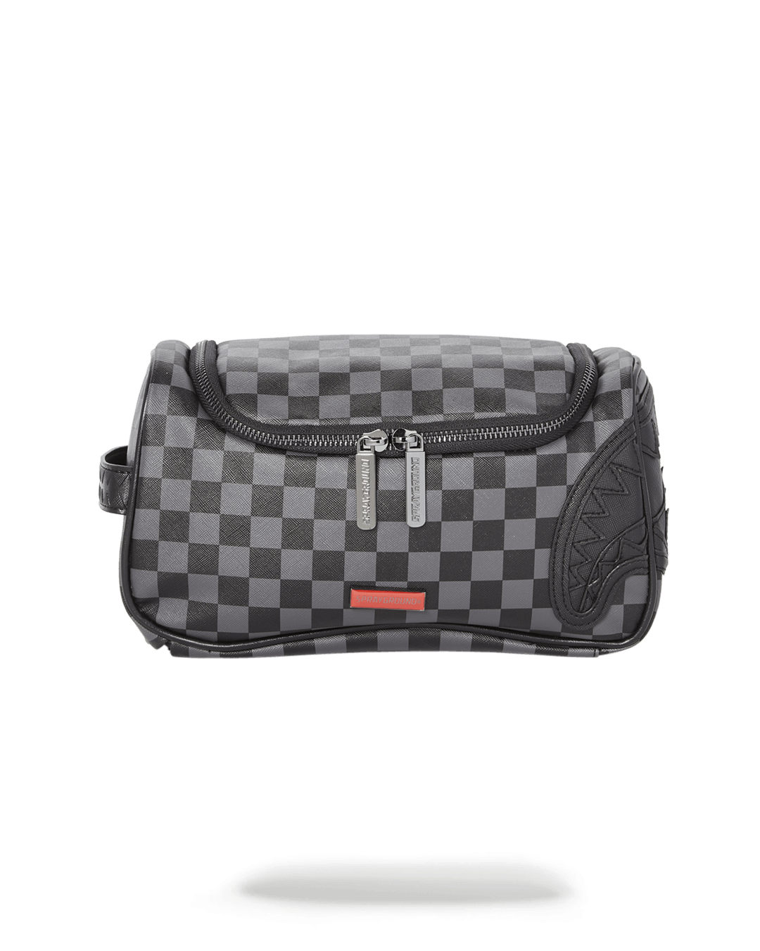 Henny Black toiletry bag open on a bathroom counter with grooming products inside
