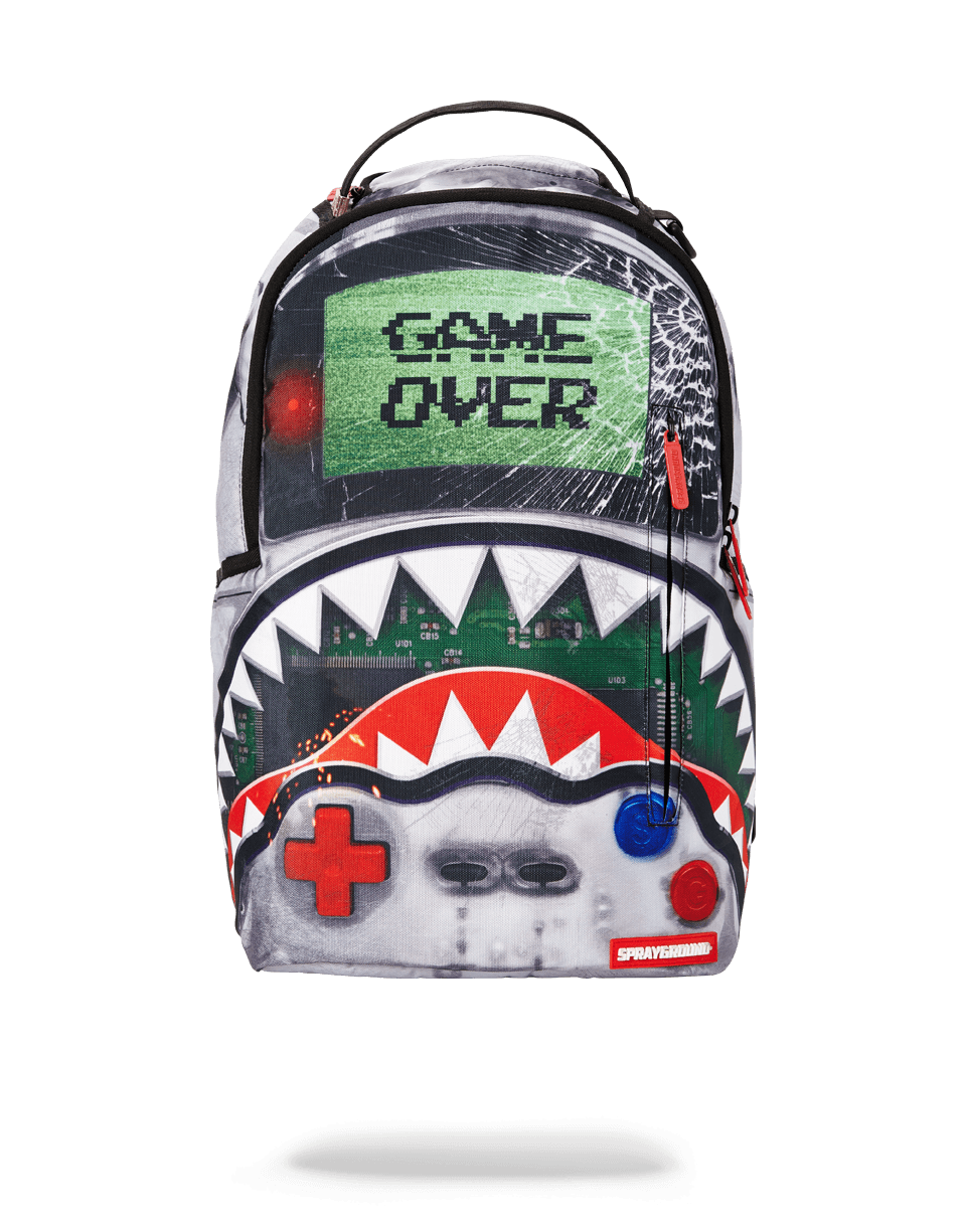 Close-up of Sprayground Shark backpack's zippered front pocket and metal hardware
