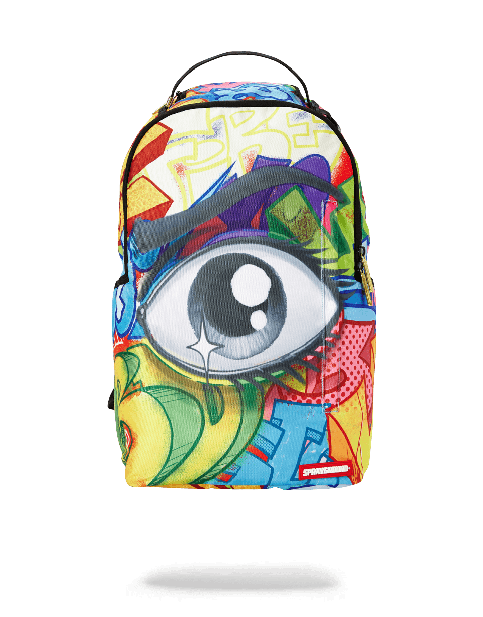 Close-up of the GRAFFITI EYE backpack's bold street art pattern and metal hardware