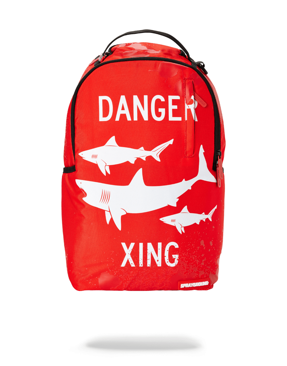 Front view of the SHARK X-ING water-resistant Sprayground backpack with shark design