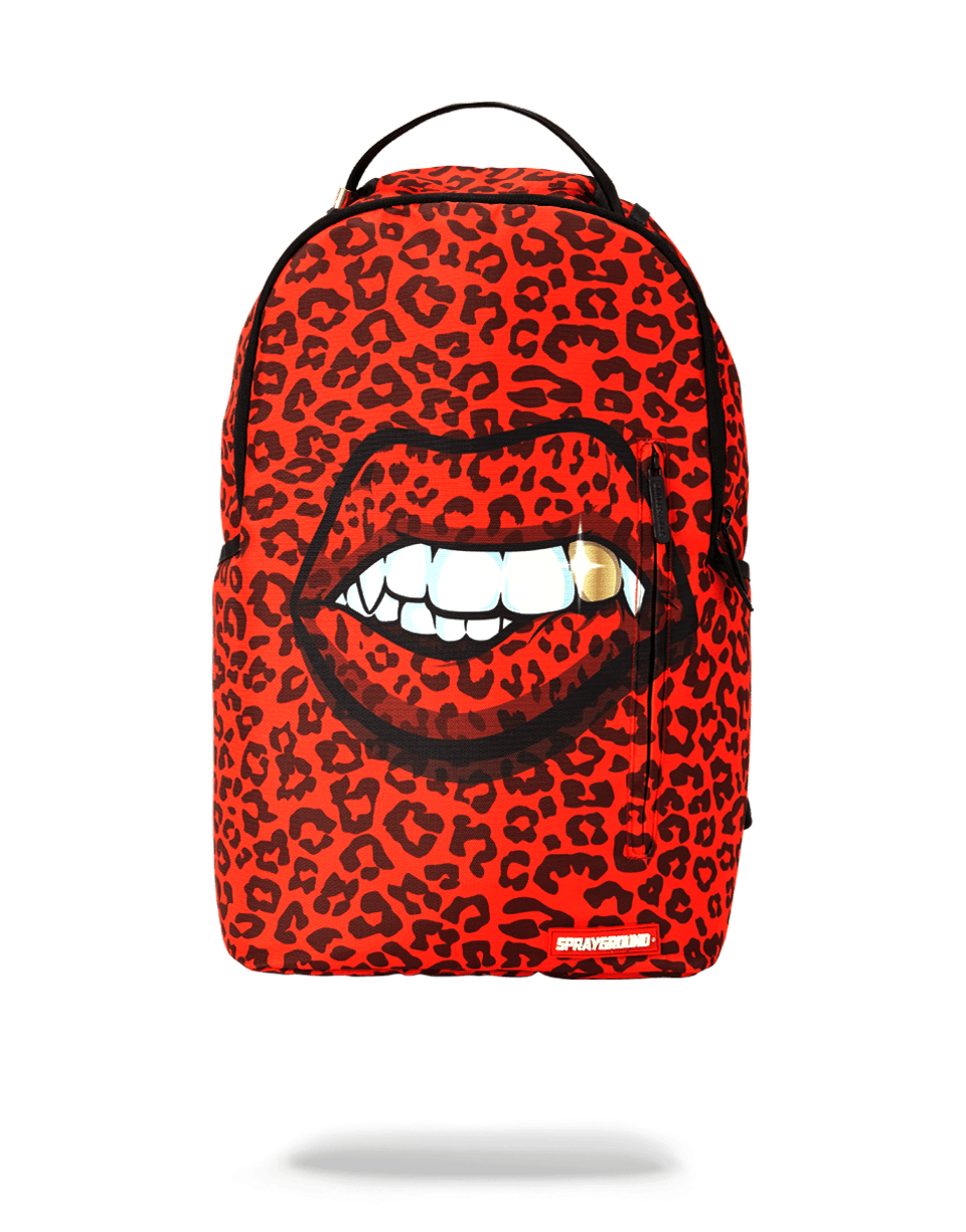 Side view of travel backpack with leopard lips and luggage sleeve