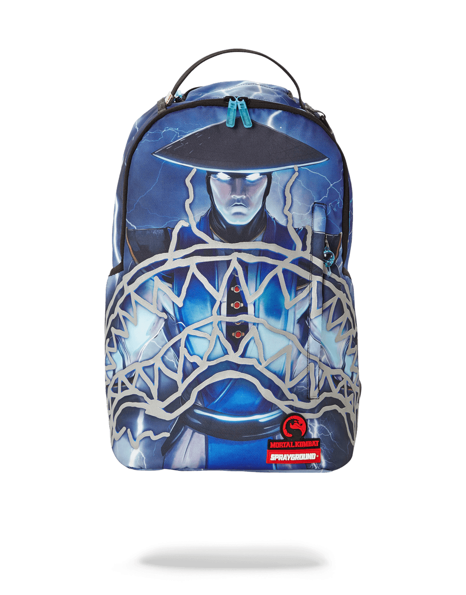 Close-up of the Raiden LED backpack's Sharkmouth reflective panel under streetlights