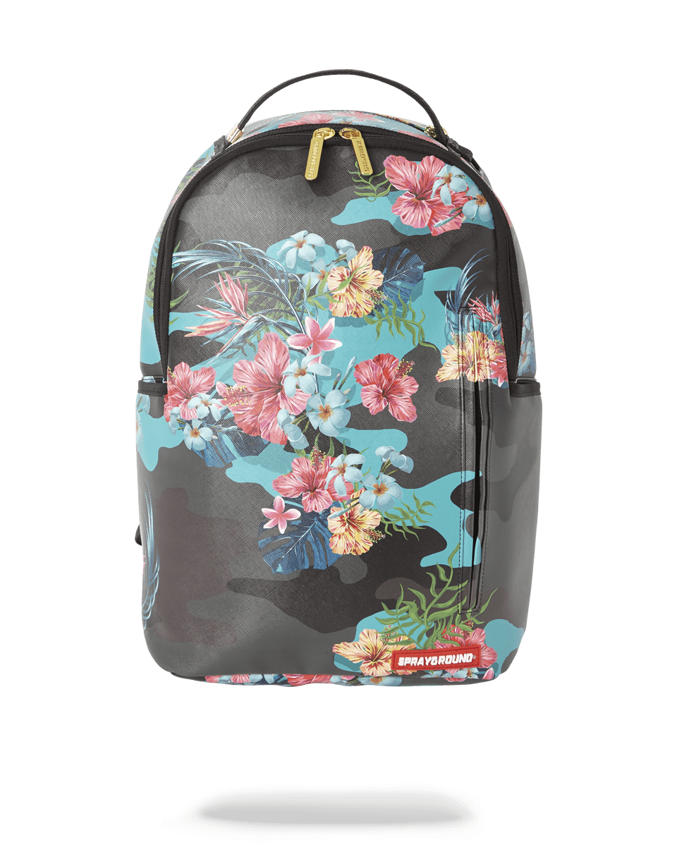 Angled front view of the designer backpack showing floral camo and metal badge