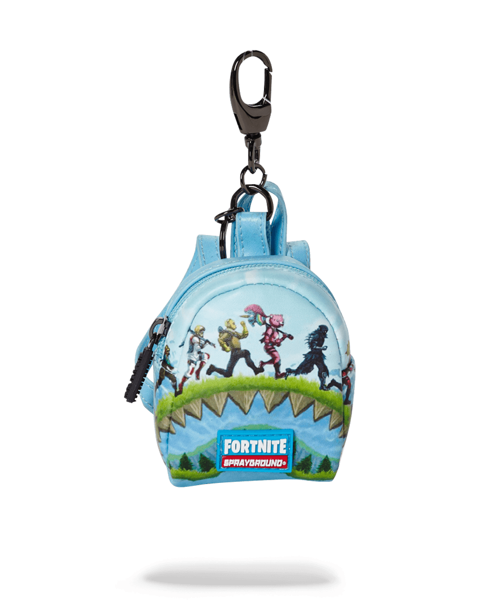 Front view of fortnite shark royale gaming keychain clipped to denim backpack