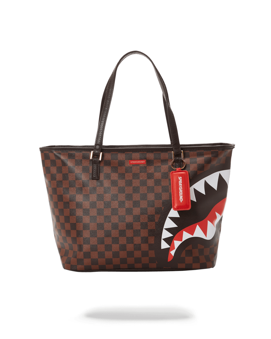 Front view of the camouflage tote bag with gold zippers and handles.