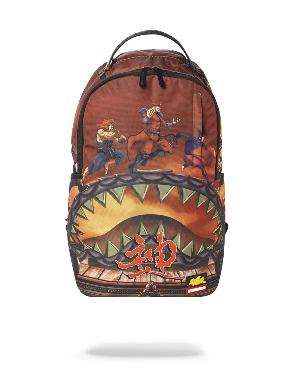 Street Fighter gaming backpack shown on a city street, highlighting side pockets and adjustable straps.