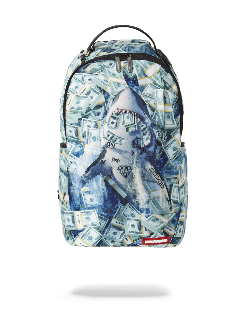 Travel backpack for women shown in use with laptop compartment open