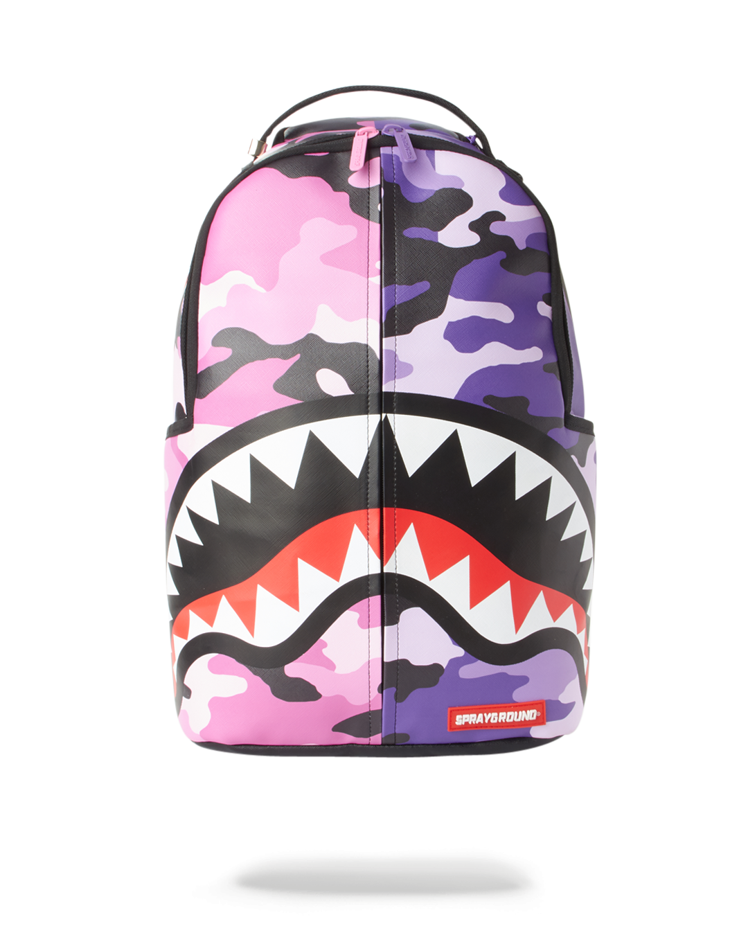 Sprayground Split Camo Backpack worn crossbody in urban setting