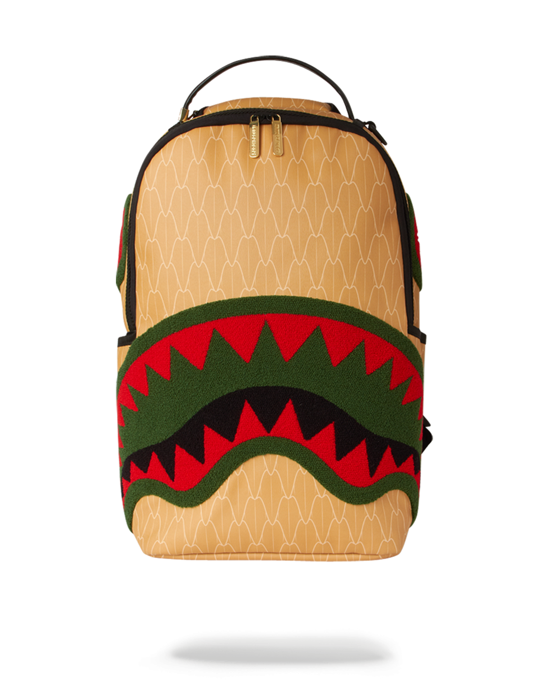 Front angle of Sprayground backpack pink edition showing shark mouth embroidery and gold zippers