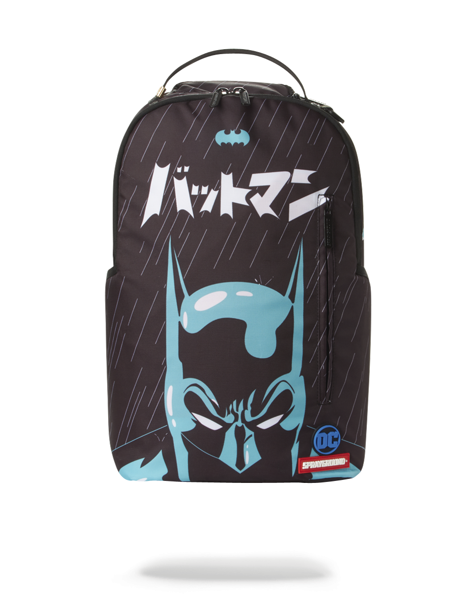 Close-up of the Batman Darknight Backpack showing the front zipper pocket and metal hardware