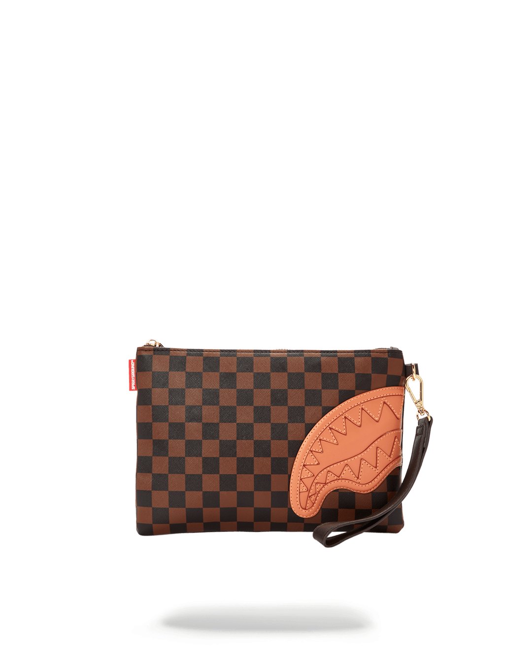 Gold evening bag displayed on a stylish table.