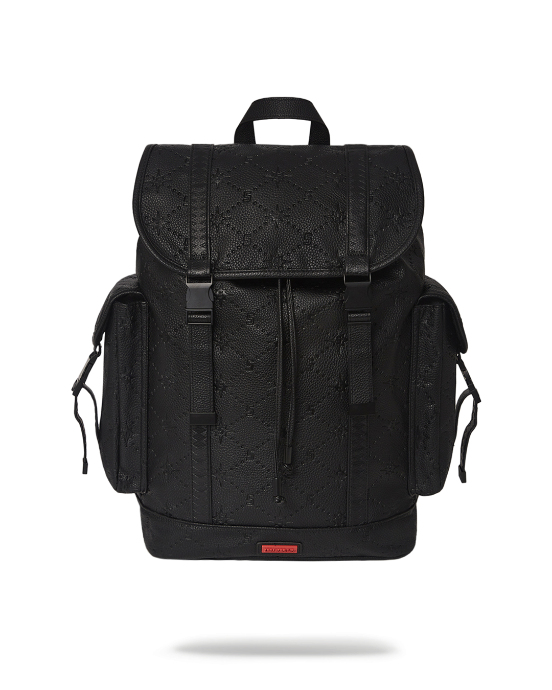 Close-up of the embossed sprayburst pattern on the vegan leather backpack
