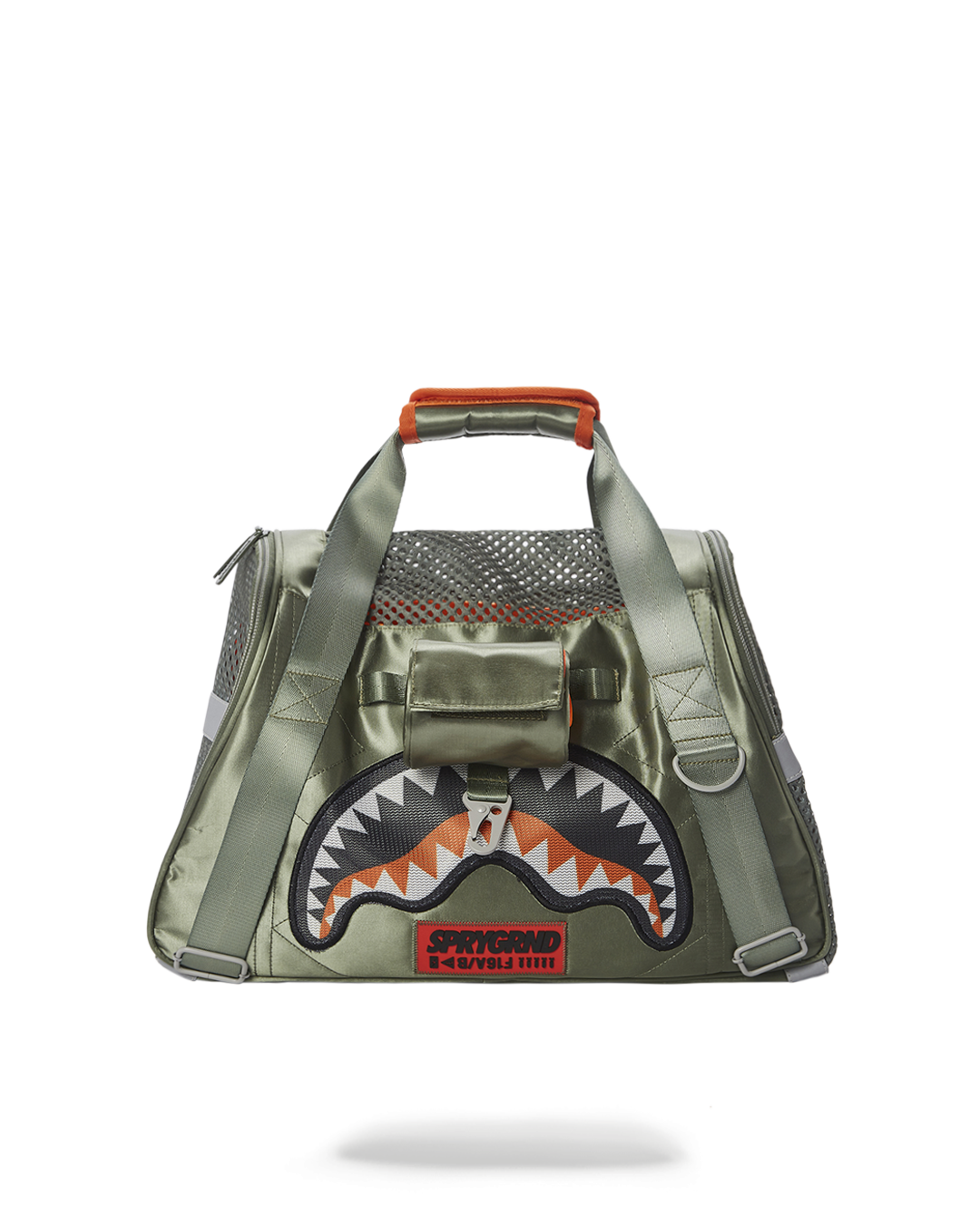 Alpha Shark pet carrier on a park bench, showcasing side handles and ventilation