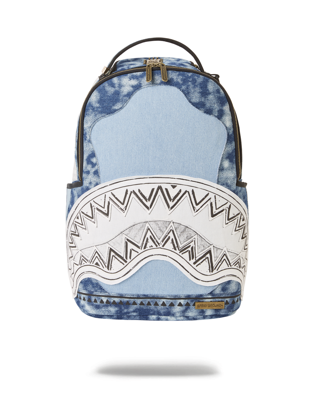 Front view of designer backpack showing pockets and metal badge