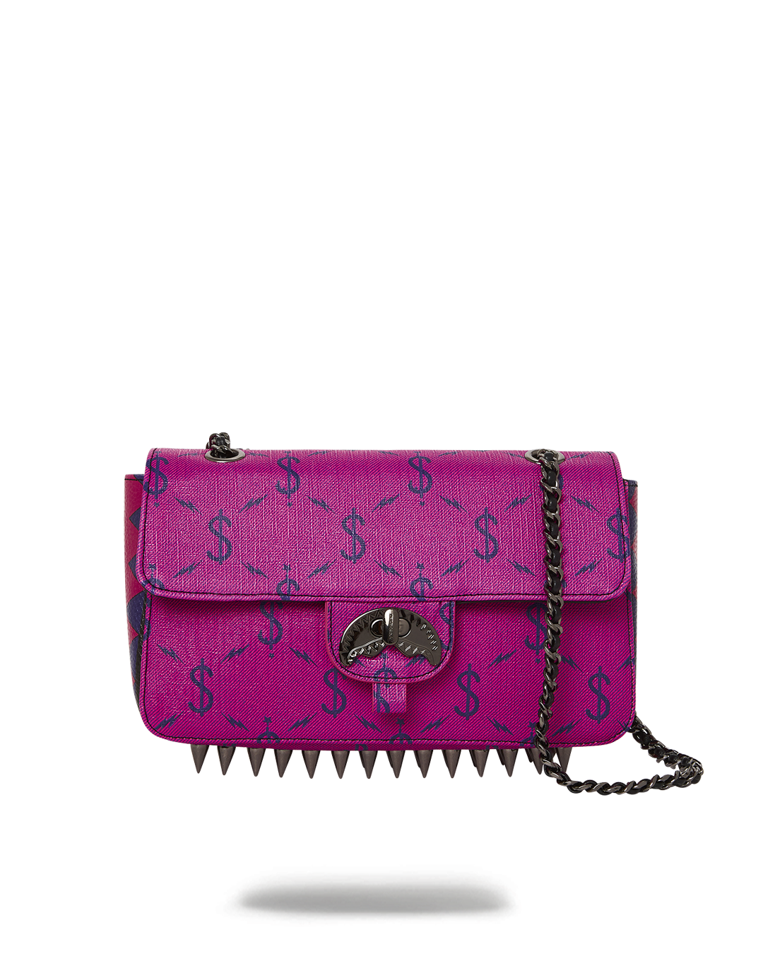 Close-up of coach shoulder bag gold shark chain and flap lock