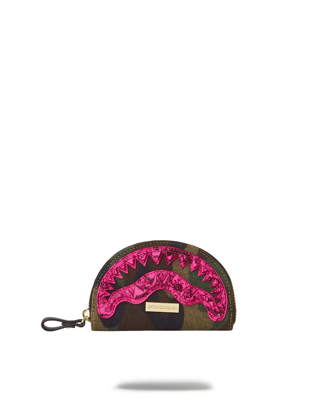 Small zipper pouch open on a desk with makeup items inside
