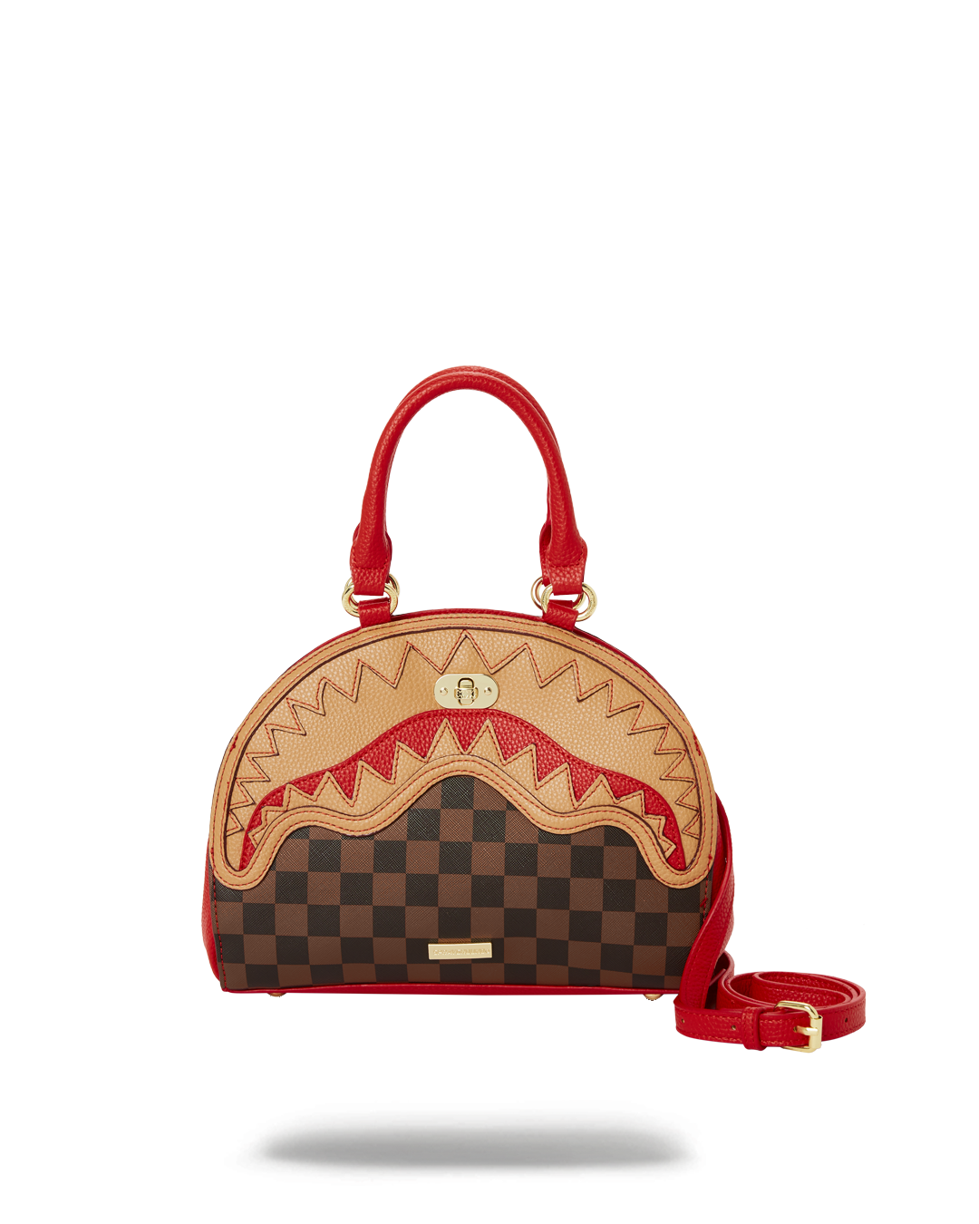 Shark crossbody bag worn over the shoulder in an urban setting.