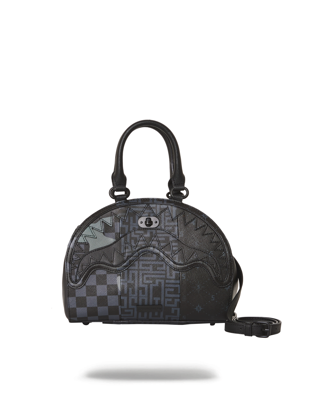Trilogy handbag with gold chain strap displayed against a chic backdrop.