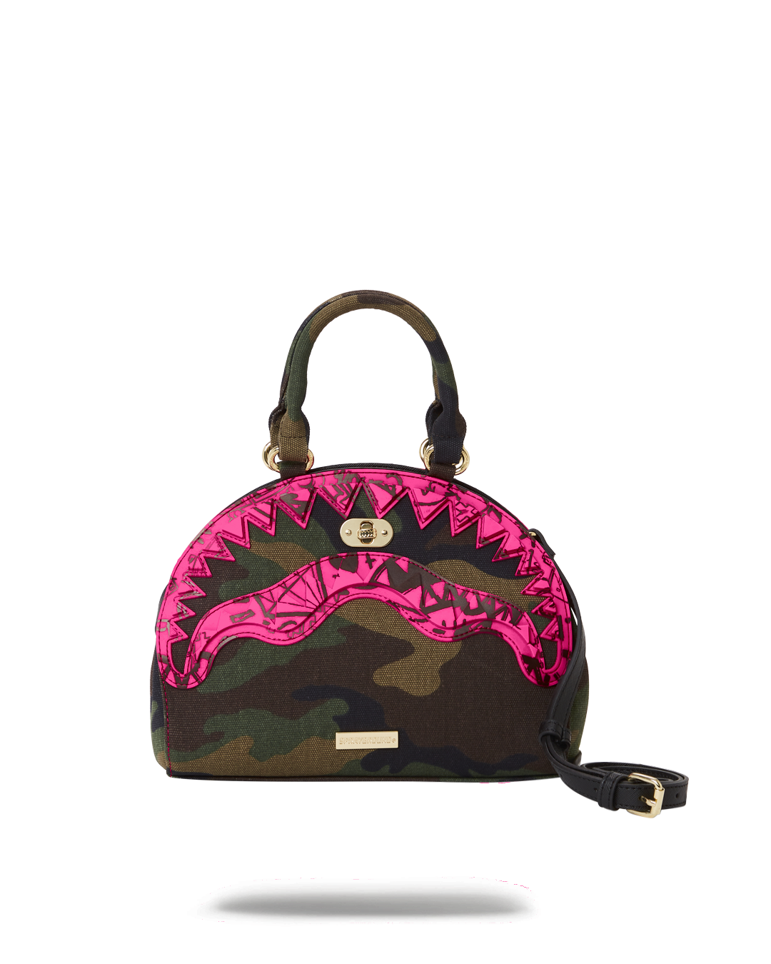 Drop Zone handbag with shark hardware and adjustable chain strap on a city street