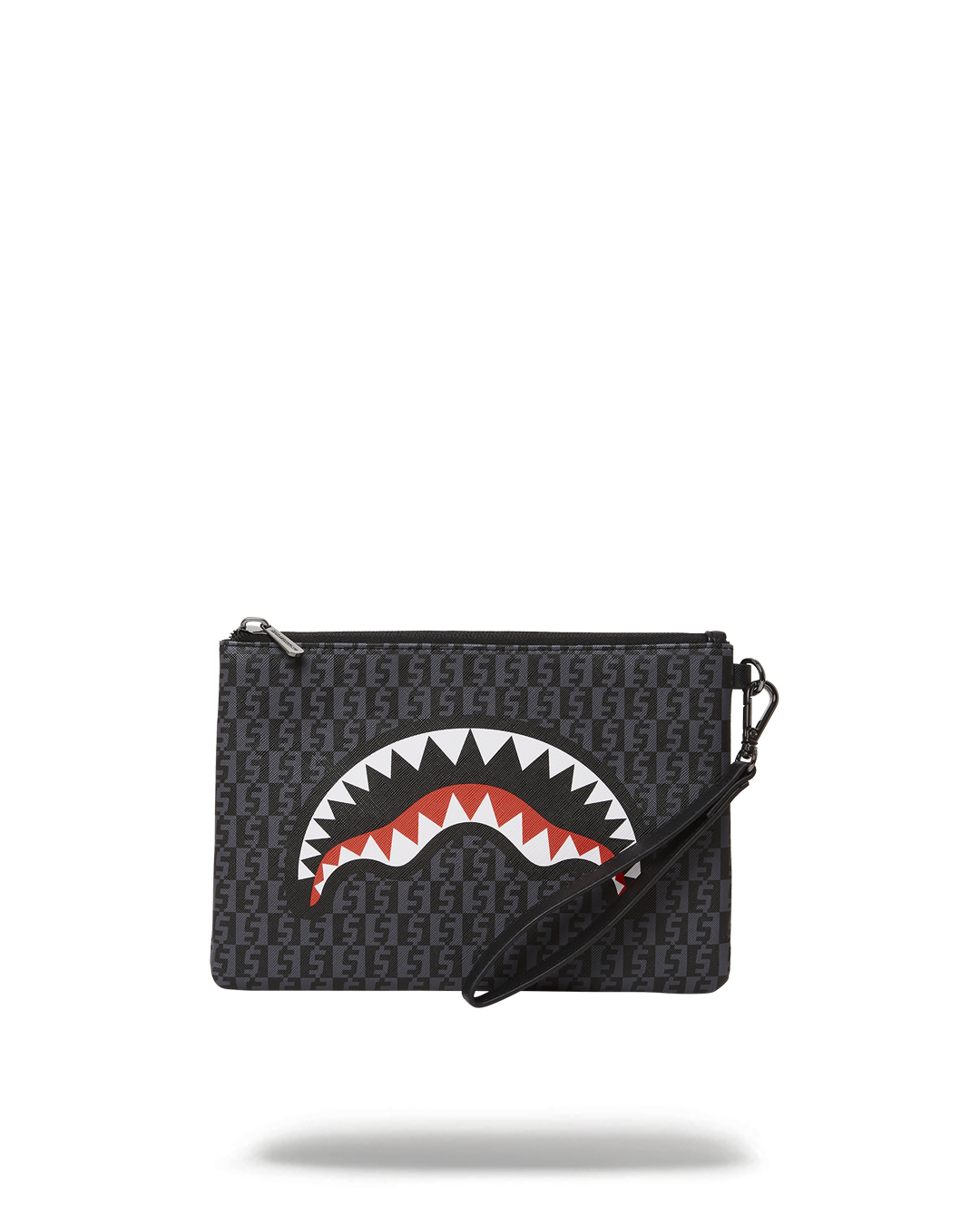 Black faux leather convertible clutch held as a tote bag