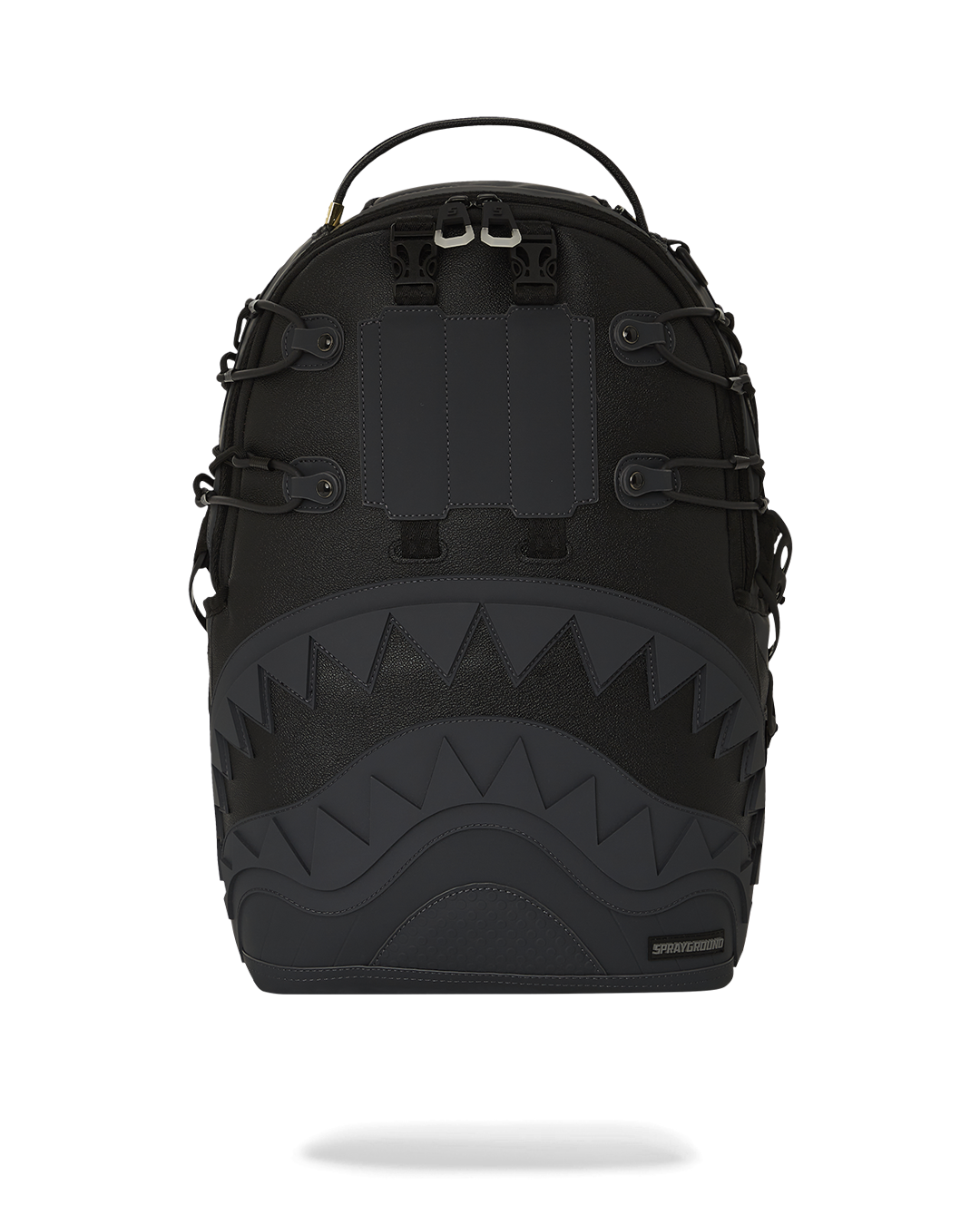Close-up of The Vault backpack's shark mouth embellishment with water-resistant faux leather