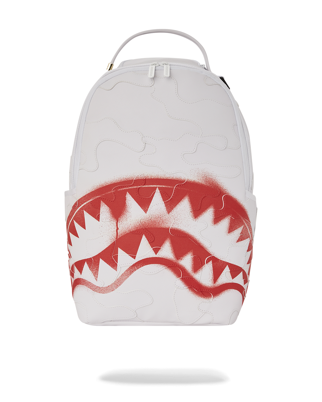 Camo backpack with faux leather finish and shark mouth design, front view